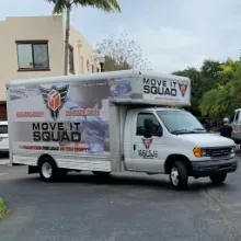 The Move It Squad branded box truck